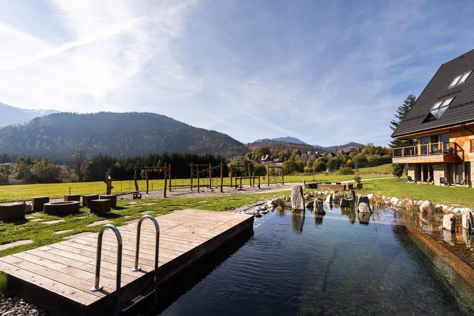 Property building, Nearby landmark, Spring, Day, Natural landscape, Mountain view, Swimming pool