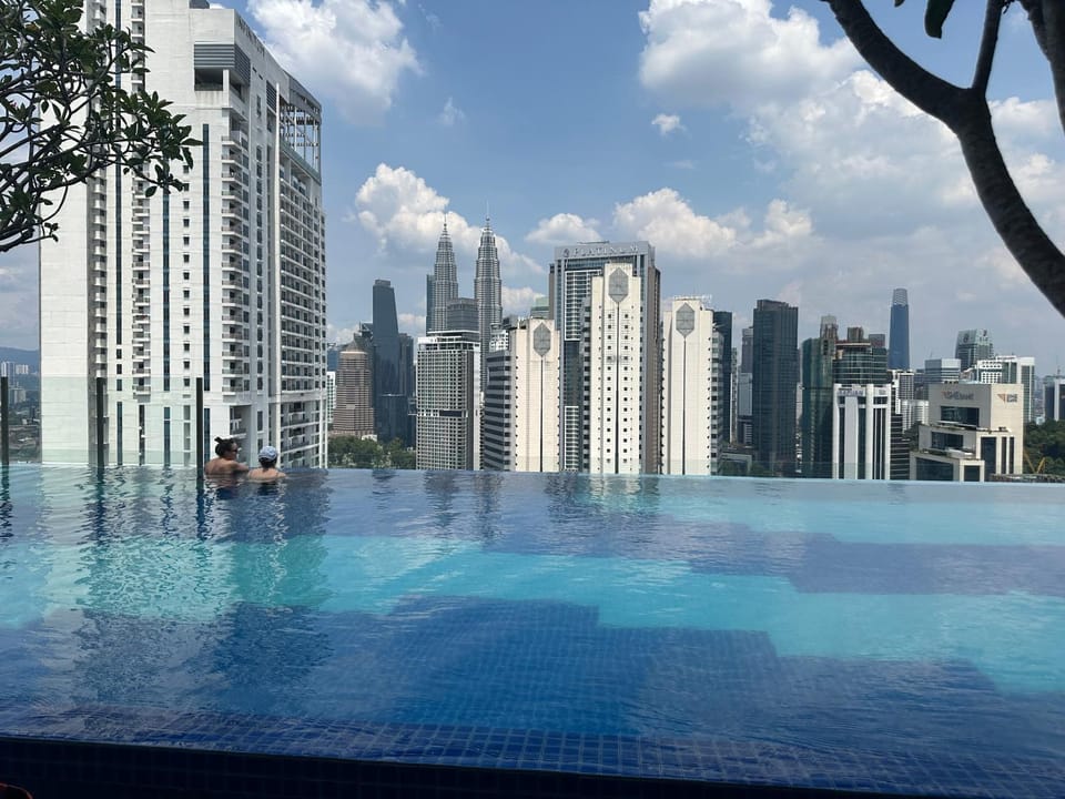 Property building, Nearby landmark, Day, City view, Pool view, Swimming pool