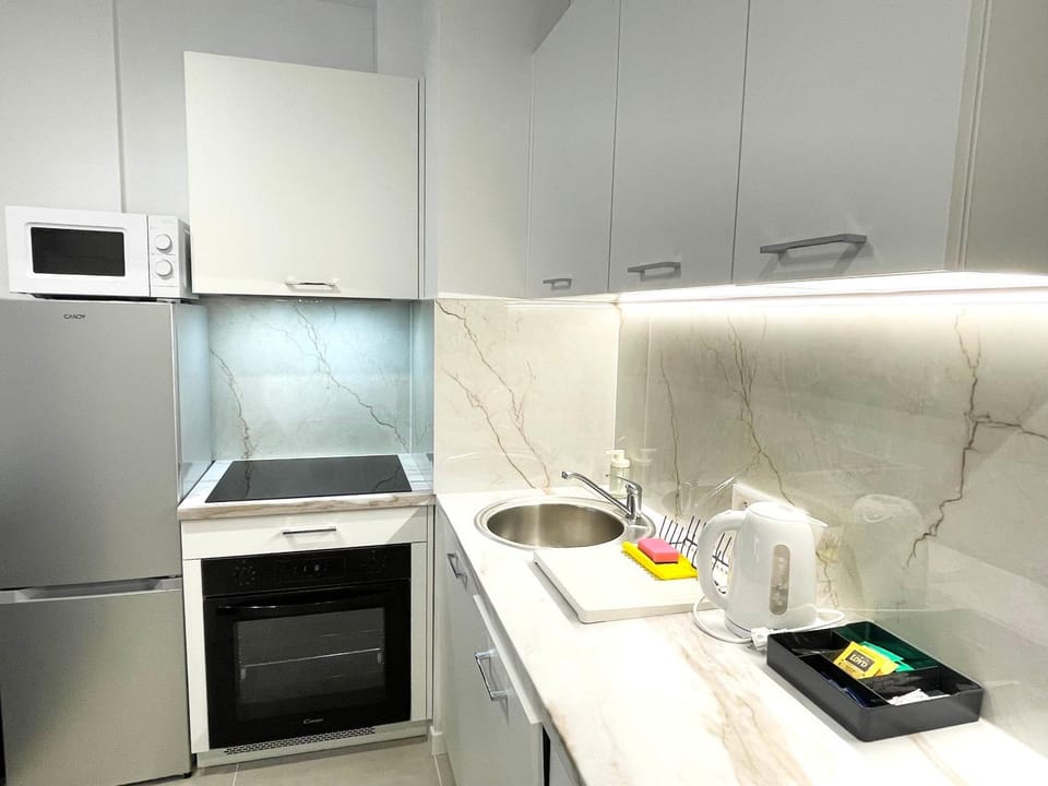 Kitchen or kitchenette, stove