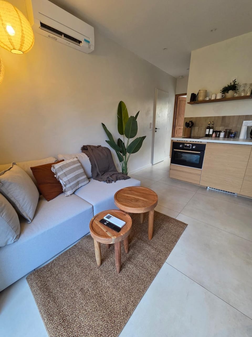Kitchen or kitchenette, Living room, Seating area, oven, stove, air conditioner