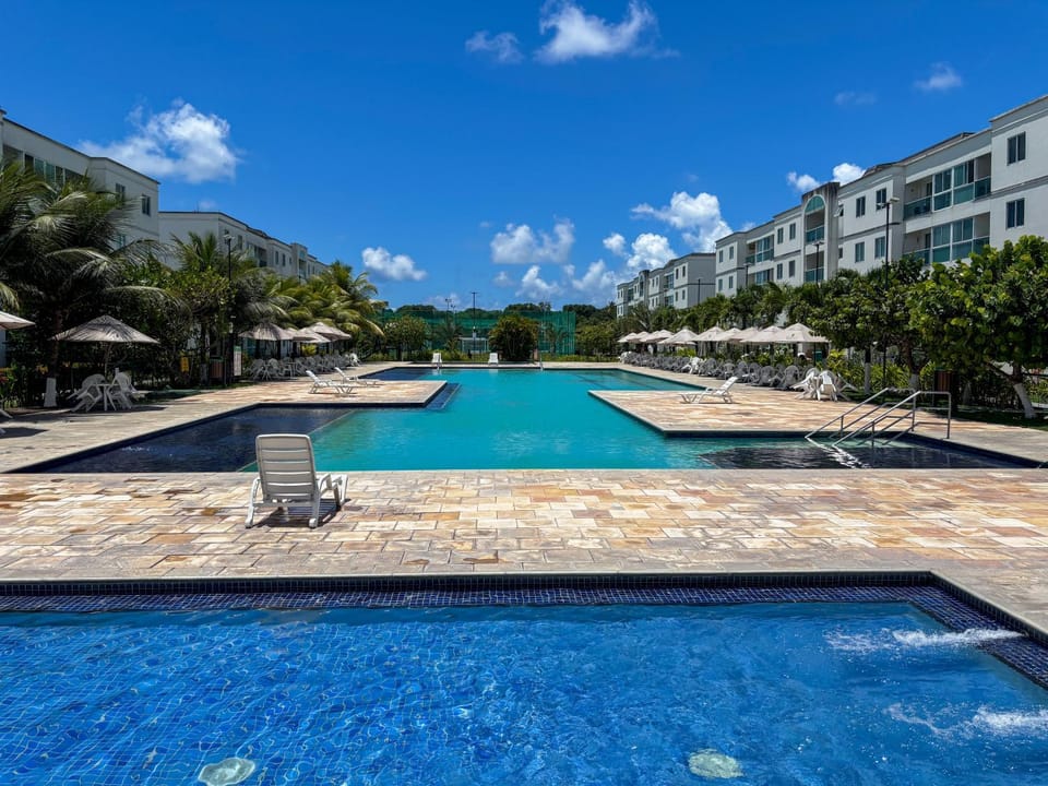Property building, Day, Pool view, Swimming pool, sunbed