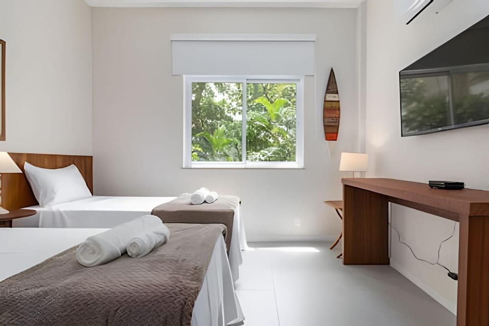 CurtaArpoador: 1 qt, arborizado, novo, 5 min praia Apartment in Rio de Janeiro