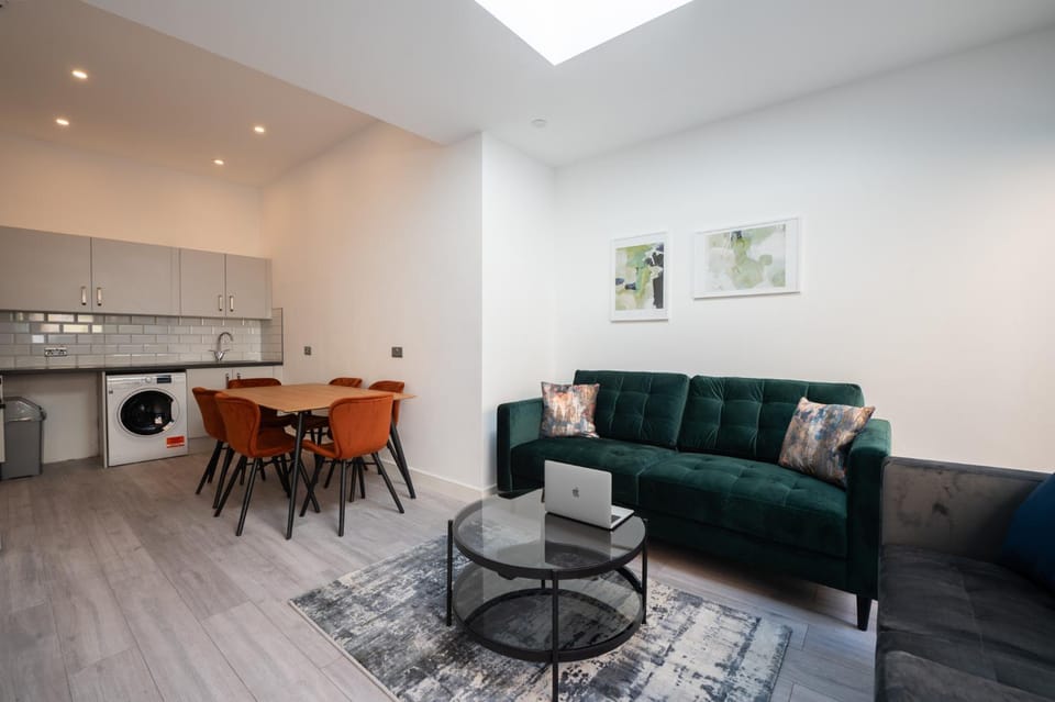 Kitchen or kitchenette, Living room, Seating area, Dining area, stove, washing machine, dryer
