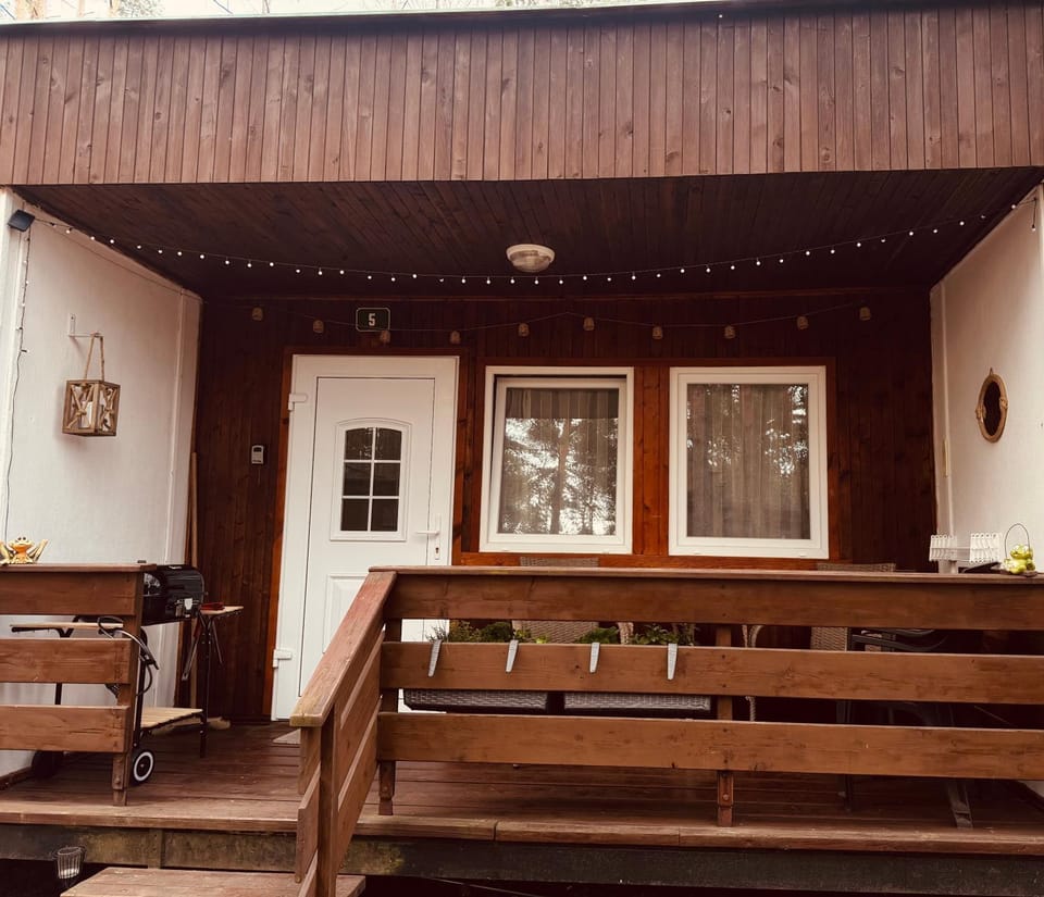Property building, BBQ facilities, Seating area