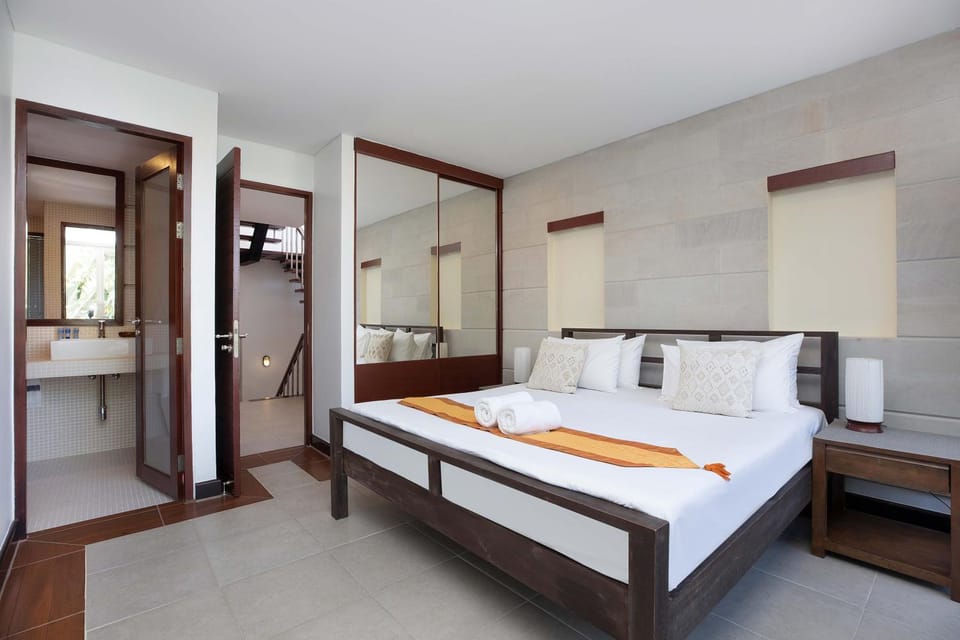 Bed, Bathroom, towels, wardrobe