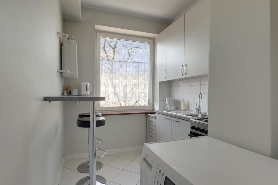 Kitchen or kitchenette, washing machine