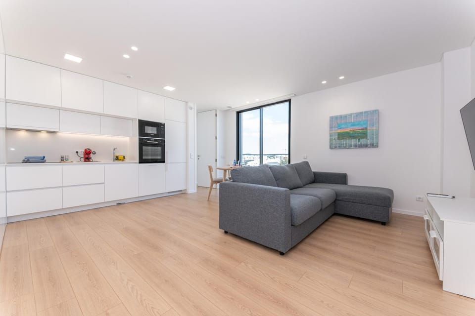 Kitchen or kitchenette, Living room, dishwasher, microwave, oven, stove, washing machine, air conditioner