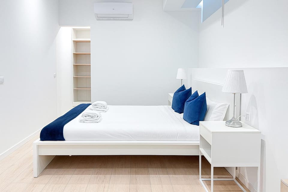 Bed, Photo of the whole room, Bedroom, towels, air conditioner