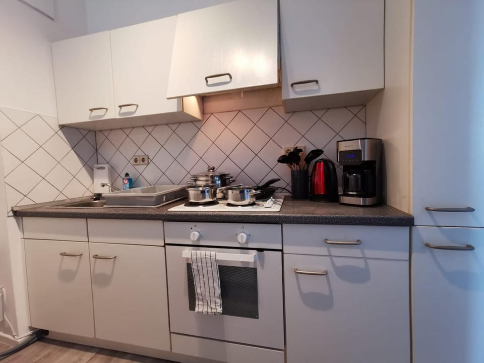 Kitchen or kitchenette, stove, kitchen