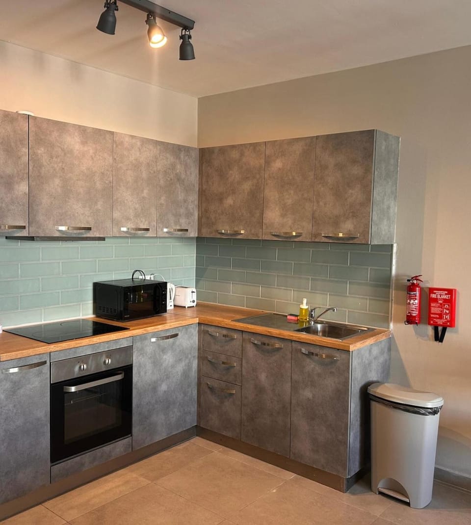 Kitchen or kitchenette, stove