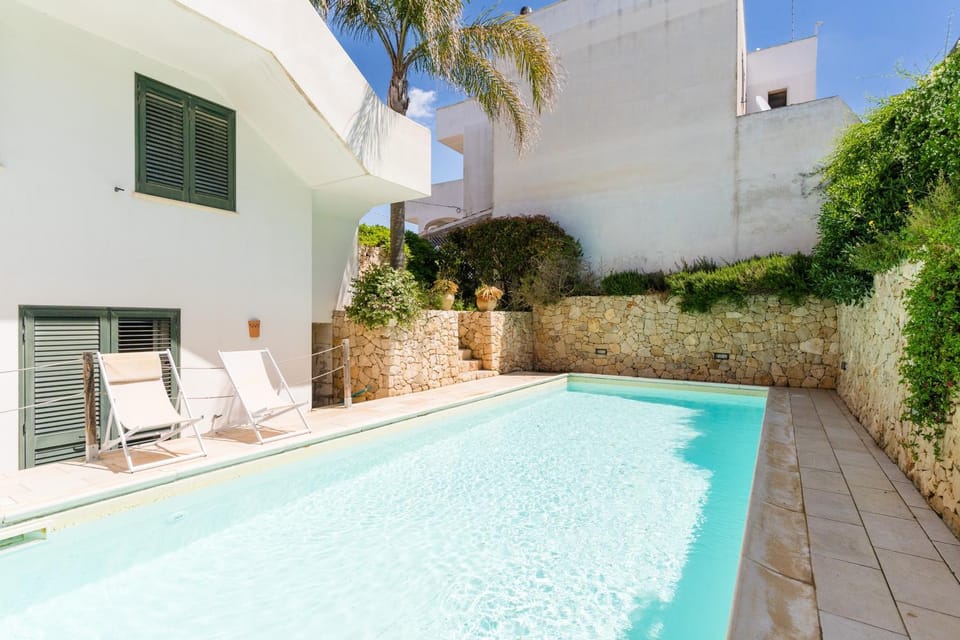 Property building, Living room, Swimming pool