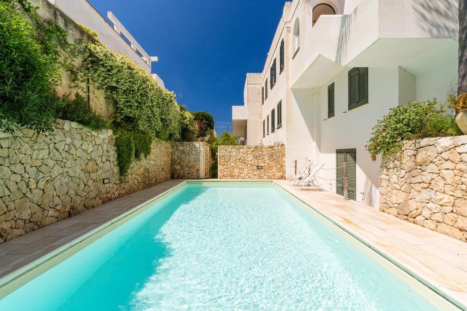 Property building, Living room, Swimming pool