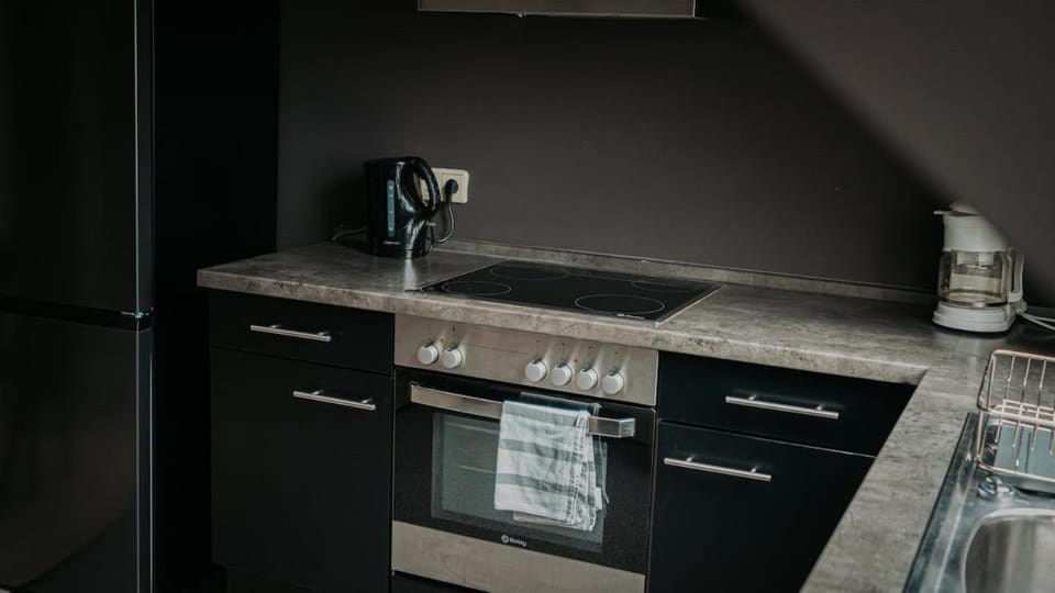 Kitchen or kitchenette, stove