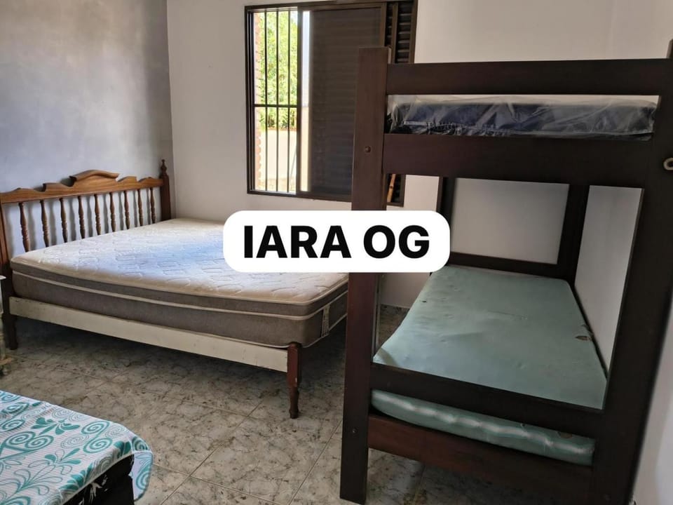 Casa com piscina a 50 metros da praia da Enseada House in State of São Paulo