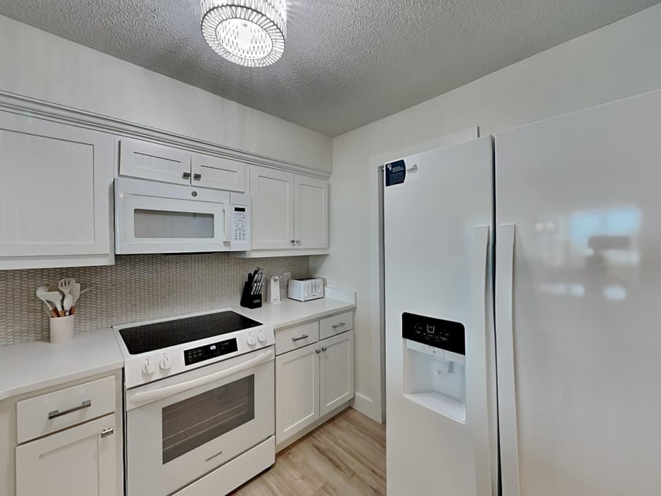 Kitchen or kitchenette, microwave, oven, stove, kitchen