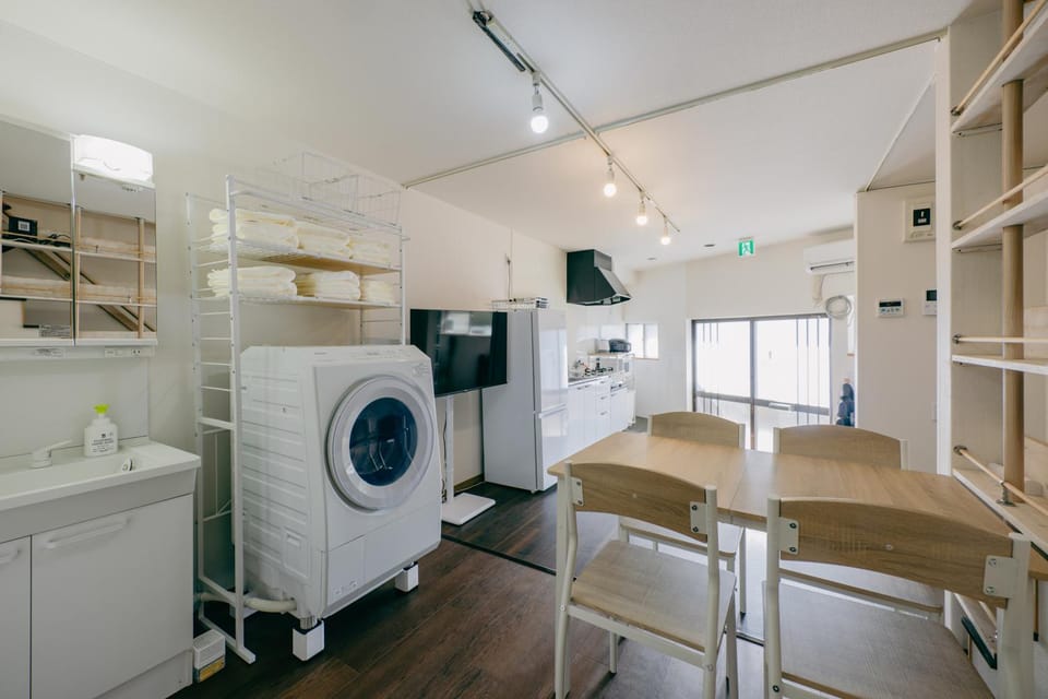 Kitchen or kitchenette, Dining area, washing machine, dryer, air conditioner