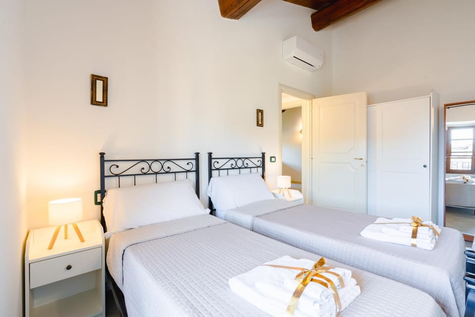 Bed, Photo of the whole room, Bedroom, towels, air conditioner