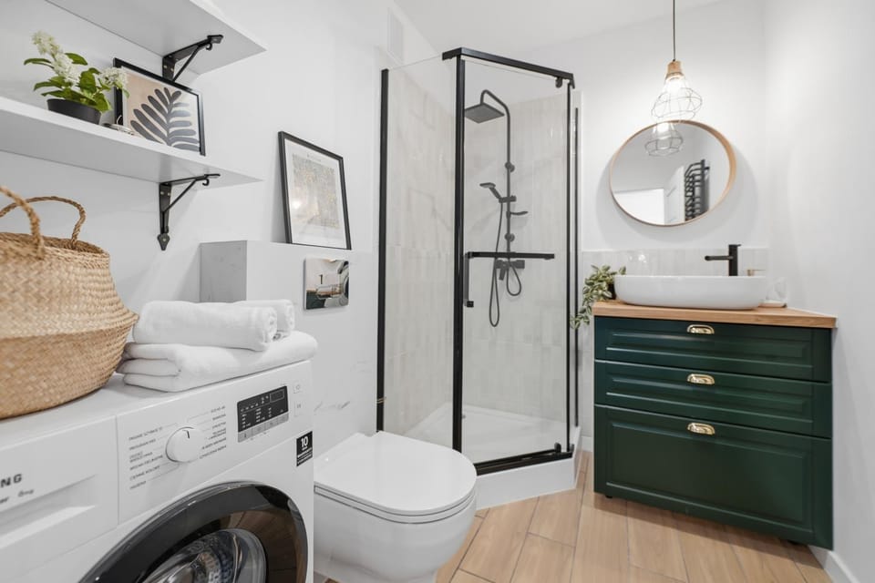 Shower, Toilet, Bathroom, towels, washing machine, dryer