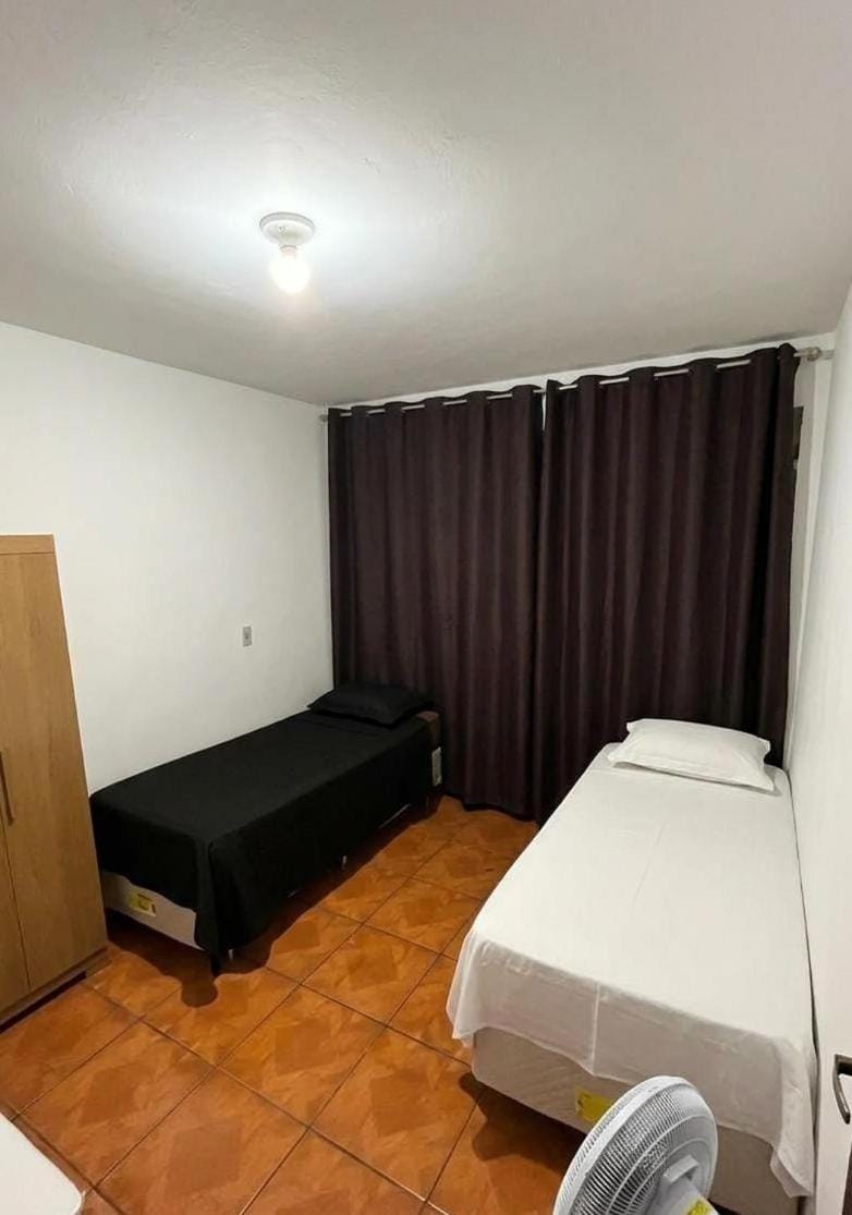 Quarto individual Aconchego Apartment in State of São Paulo