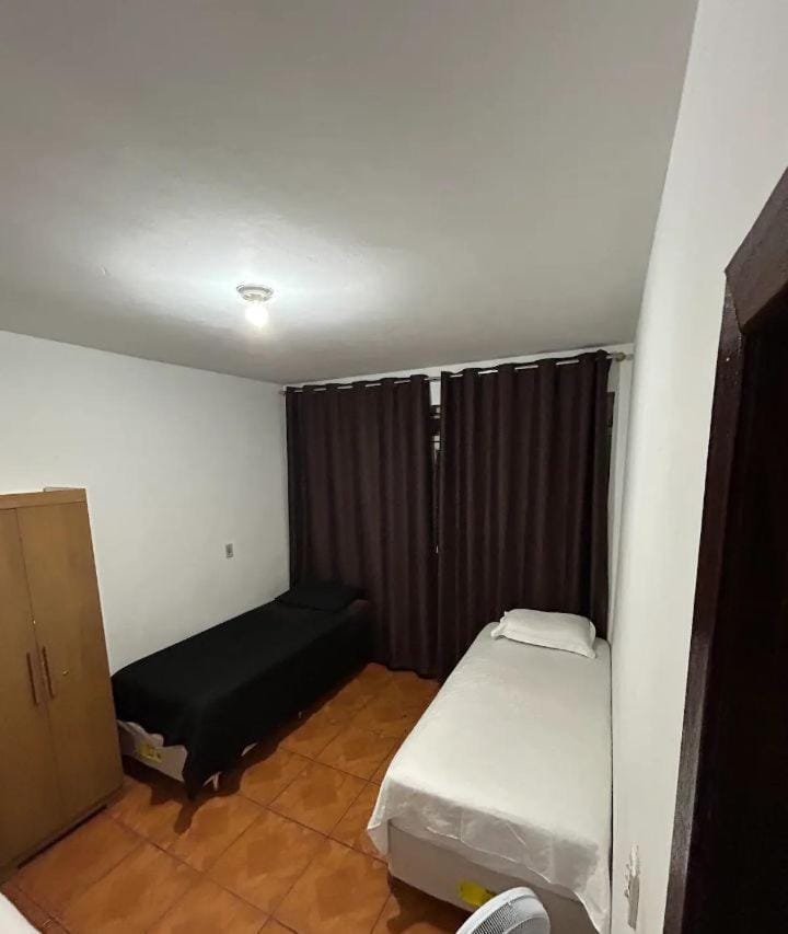 Quarto individual Aconchego Apartment in State of São Paulo