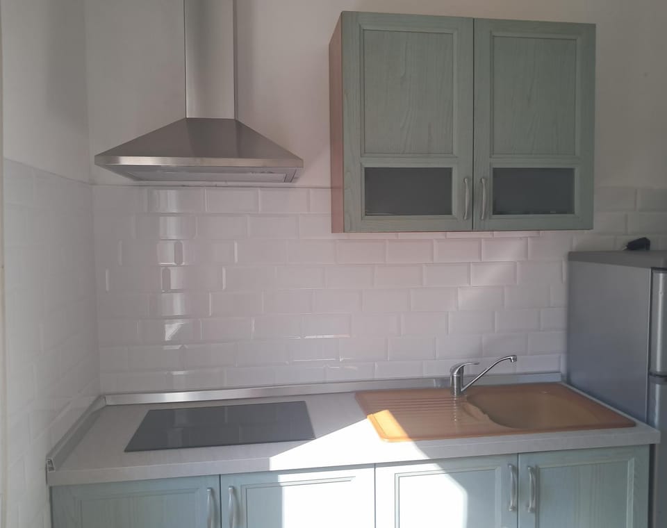 Kitchen or kitchenette, stove