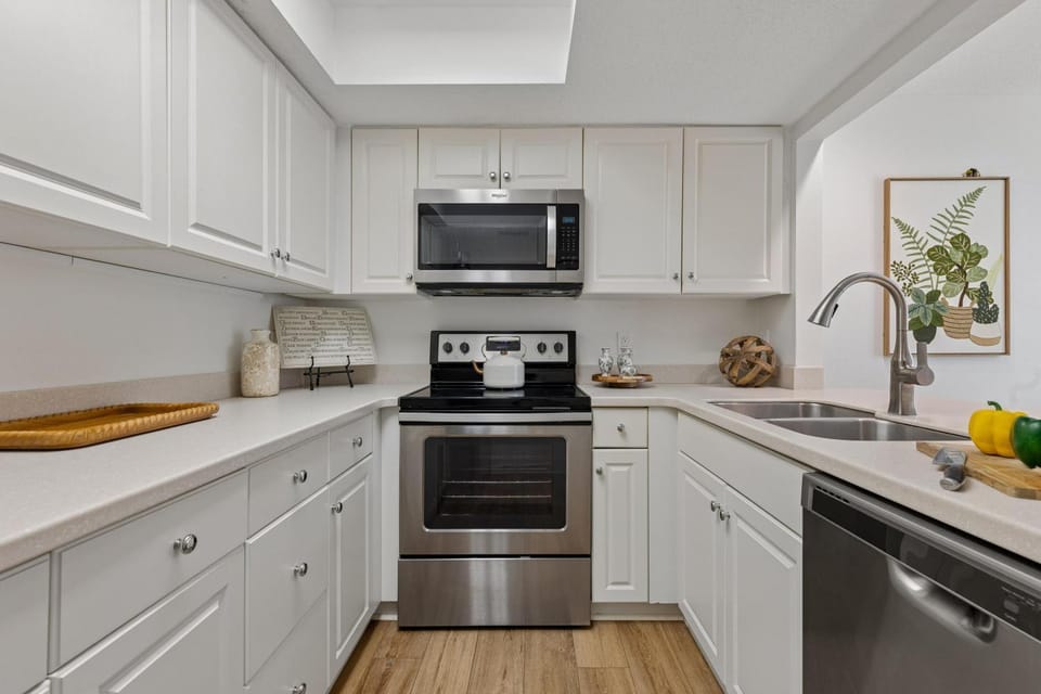 Kitchen or kitchenette, dishwasher, oven, stove, toaster