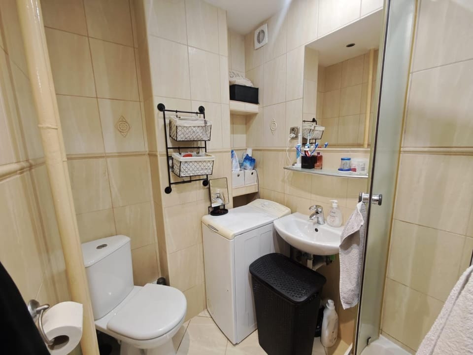 Shower, Toilet, Bathroom, towels, washing machine, dryer