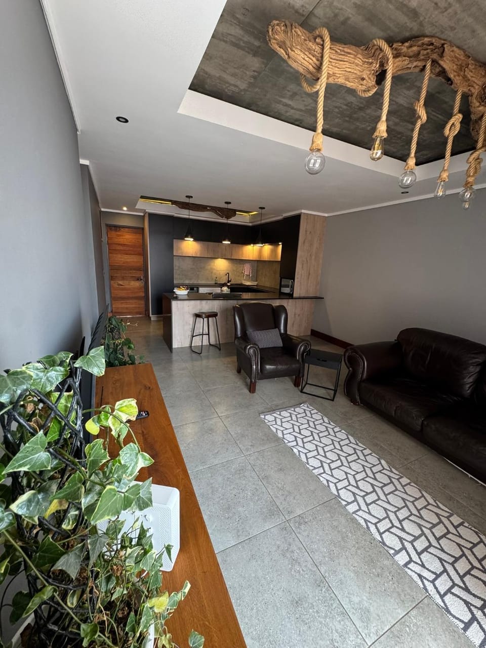 Kitchen or kitchenette, Living room, Seating area, Dining area