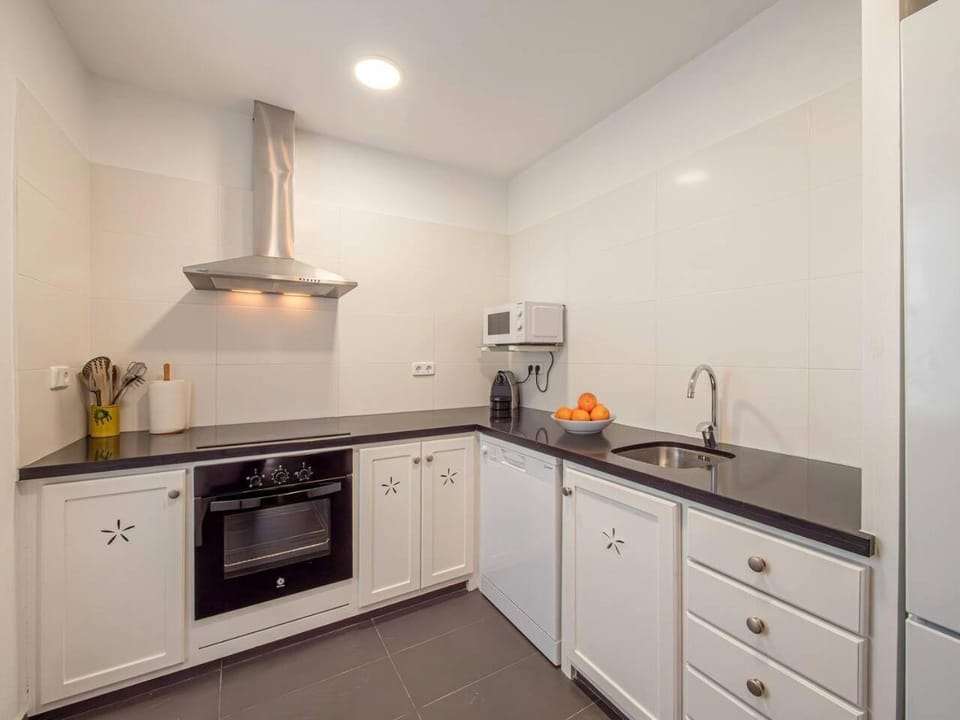 Kitchen or kitchenette, dishwasher, oven, stove, kitchen