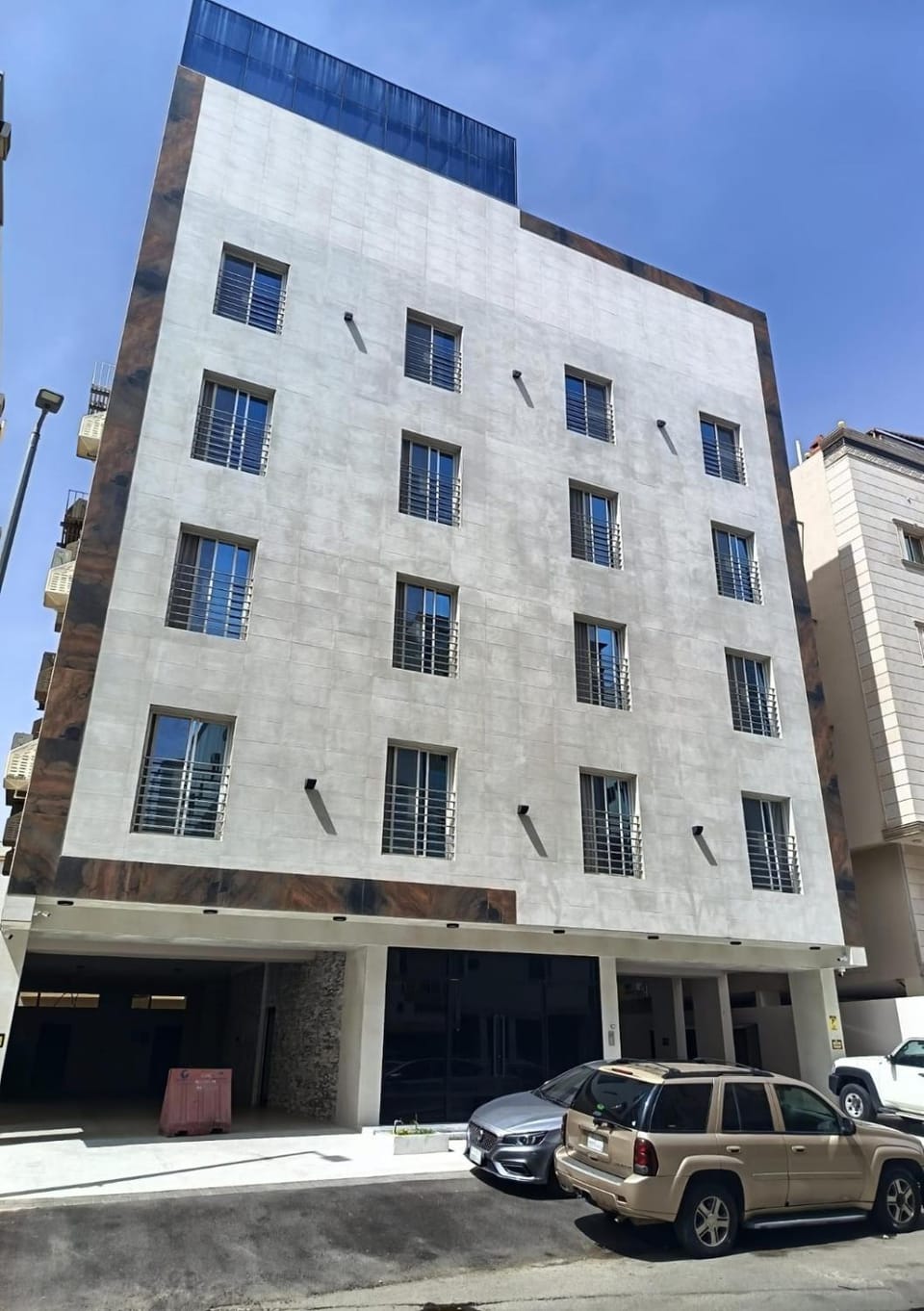 Property building, Day, Location, Parking