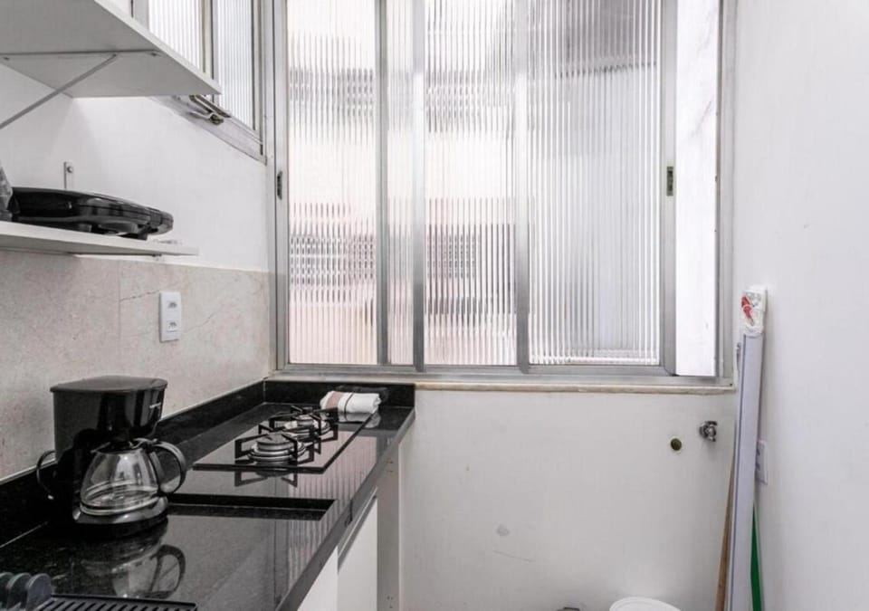 Kitchen or kitchenette, stove, toaster