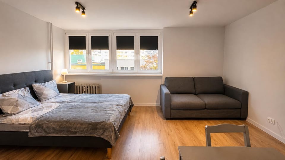 Bed, Living room, Seating area, Bedroom