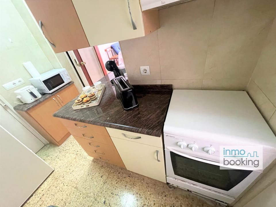 Kitchen or kitchenette, oven