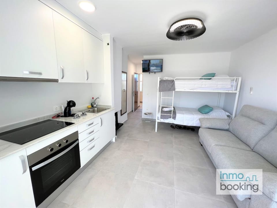 Kitchen or kitchenette, bunk bed, oven, stove