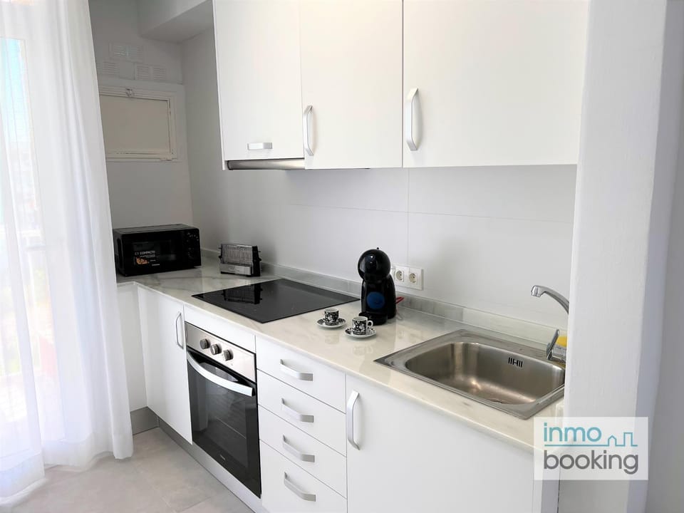 Kitchen or kitchenette, stove