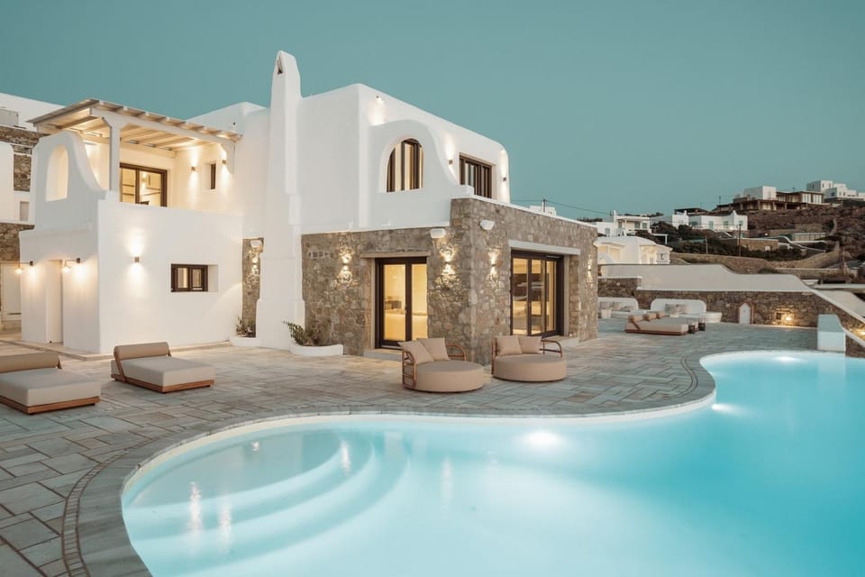 Property building, Patio, Night, Pool view, Swimming pool, sunbed