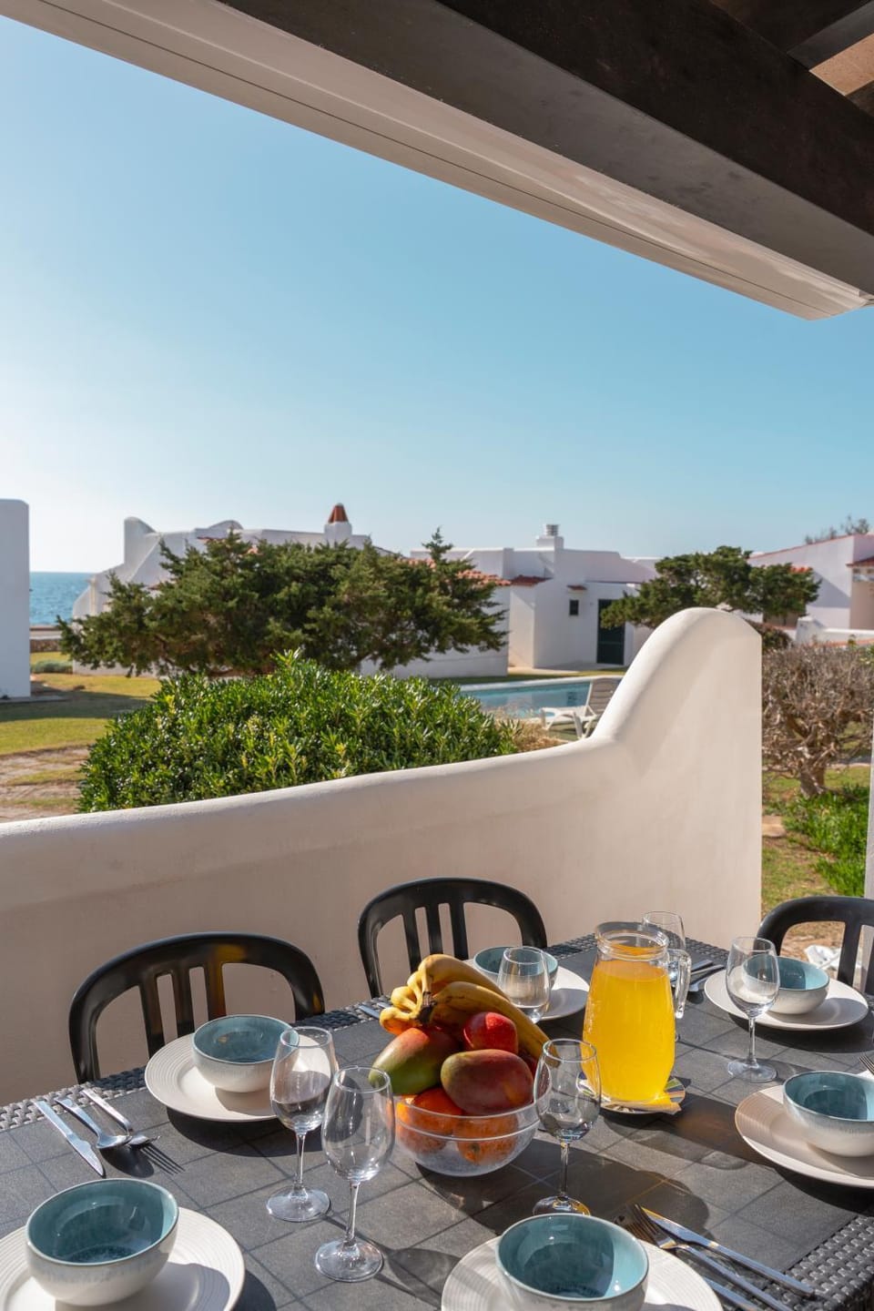 Patio, Off site, Day, Dining area, Pool view, Sea view