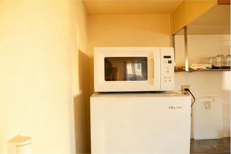 Kitchen or kitchenette, microwave