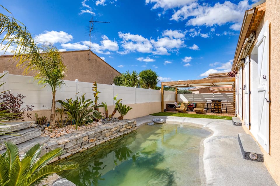 Property building, Living room, Swimming pool