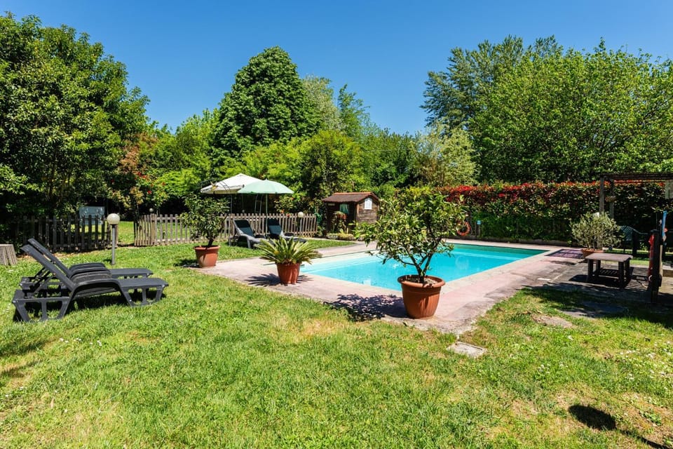 Property building, Living room, Swimming pool