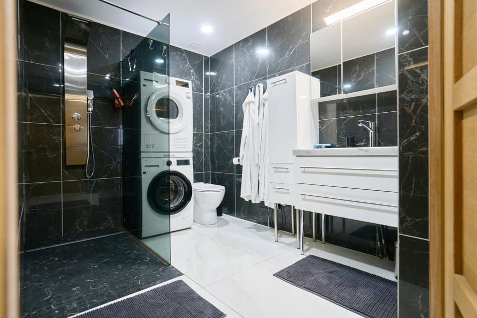 Shower, Bathroom, towels, washing machine, dryer