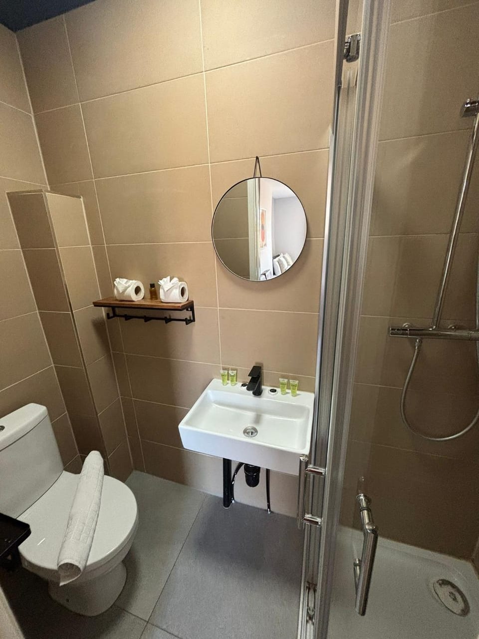 Shower, Toilet, Bathroom, hair dryier, towels