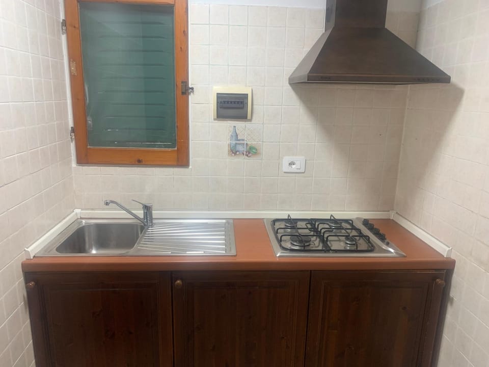 Kitchen or kitchenette, stove