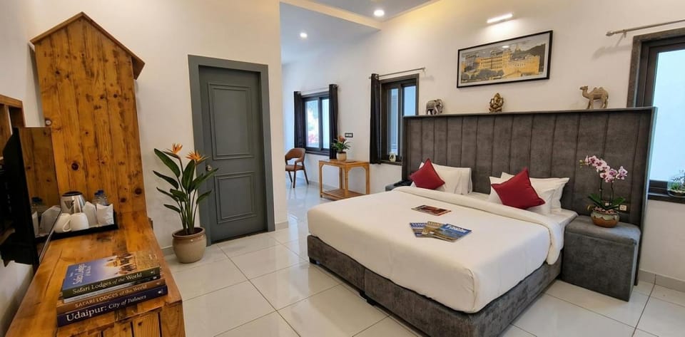 Bed, Coffee/tea facilities, Living room, Photo of the whole room, Seating area, Bedroom, air conditioner