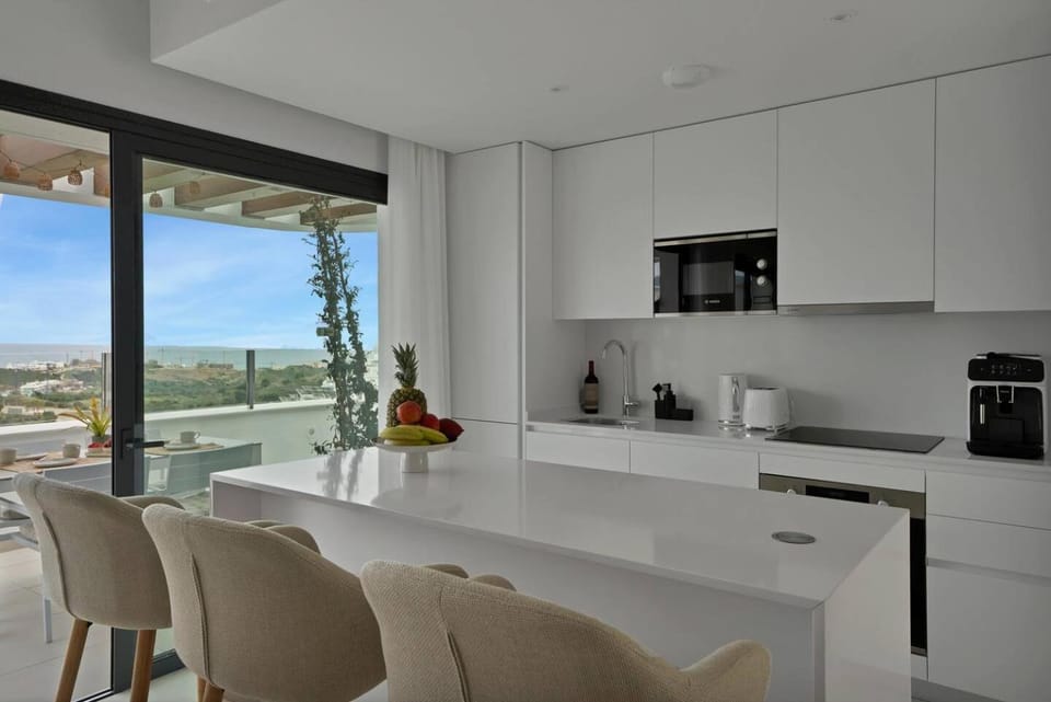 Coffee/tea facilities, View (from property/room), Seating area, microwave, oven, stove, kitchen