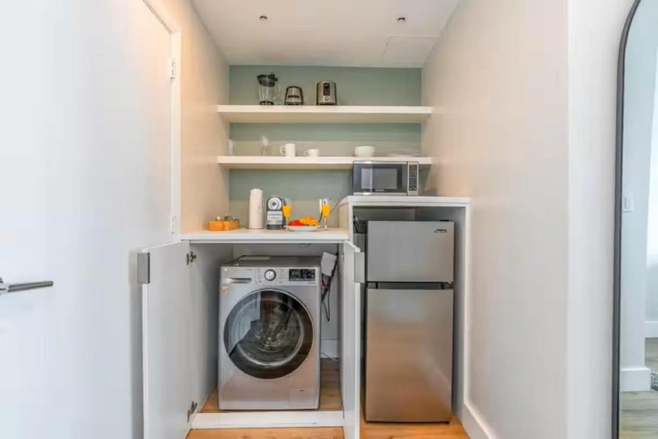 Kitchen or kitchenette, washing machine