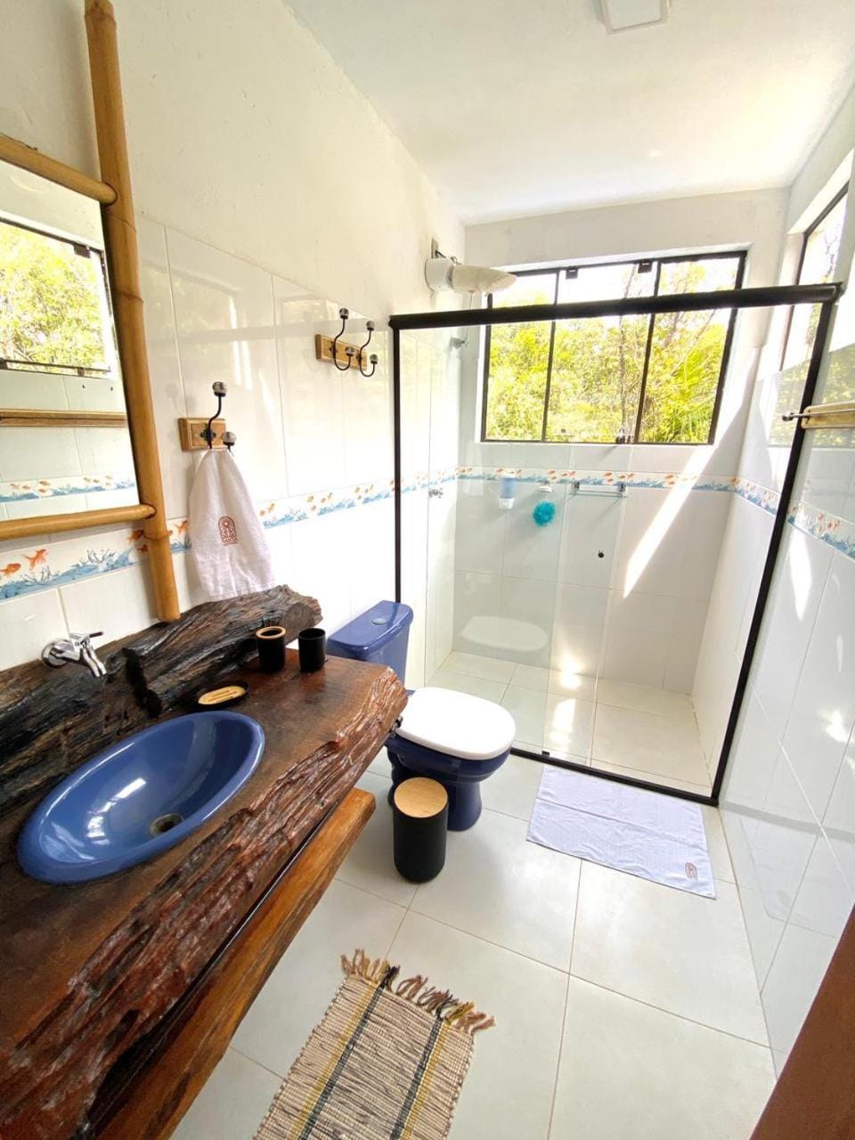 Chalé romântico no condomínio - suite com ar condicionado, churrasqueira e lagoa House in Imbituba