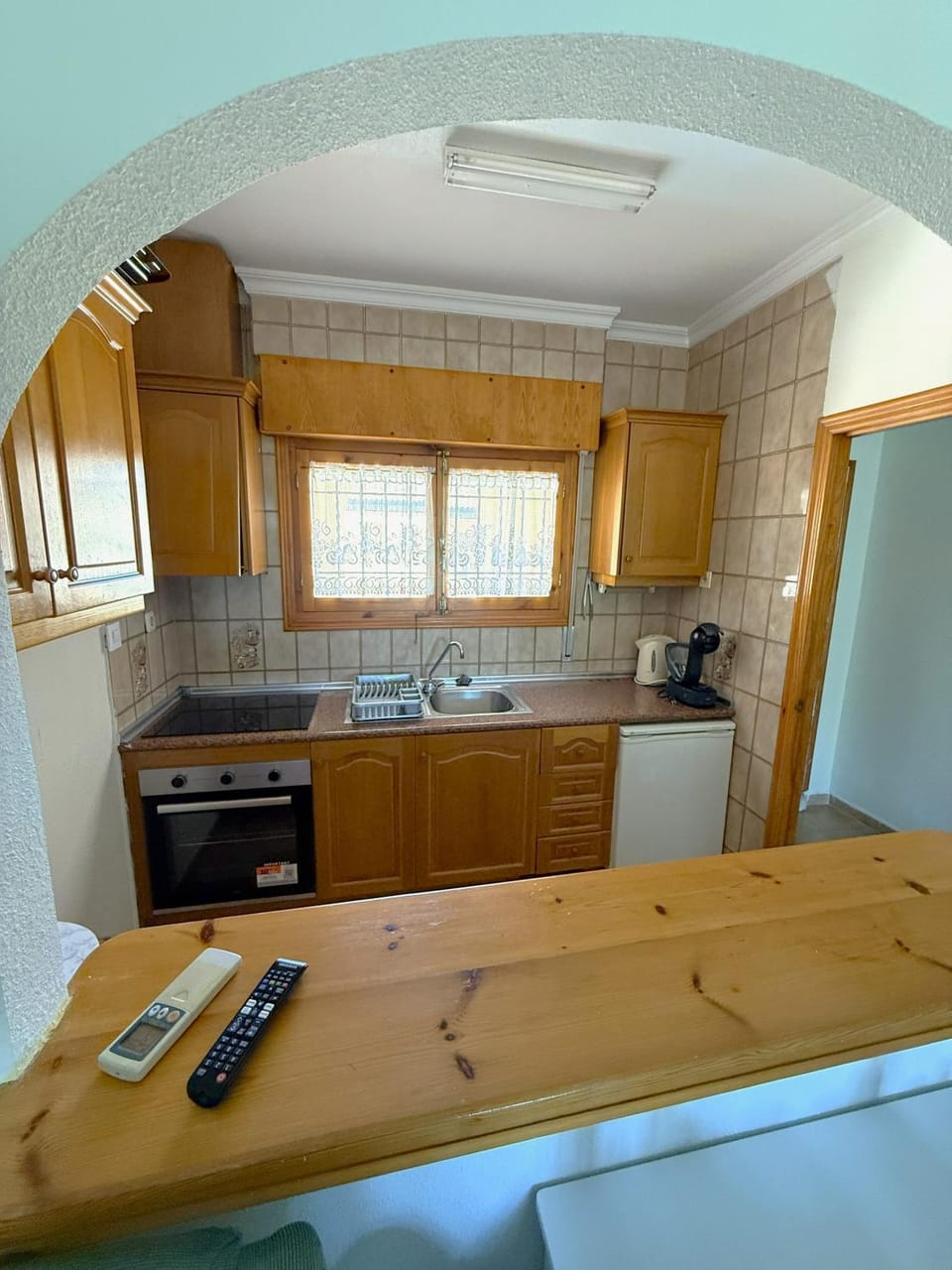 Kitchen or kitchenette, oven, stove