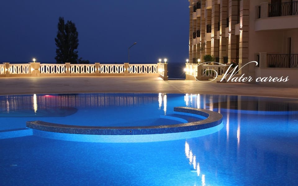Property building, Night, Pool view, Swimming pool