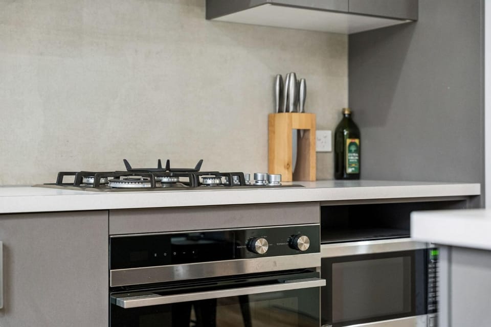 Kitchen or kitchenette, oven, stove